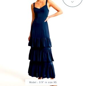 Ruffle tiered maxi dress from Abercrombie. Retails for $150. Selling for $65.